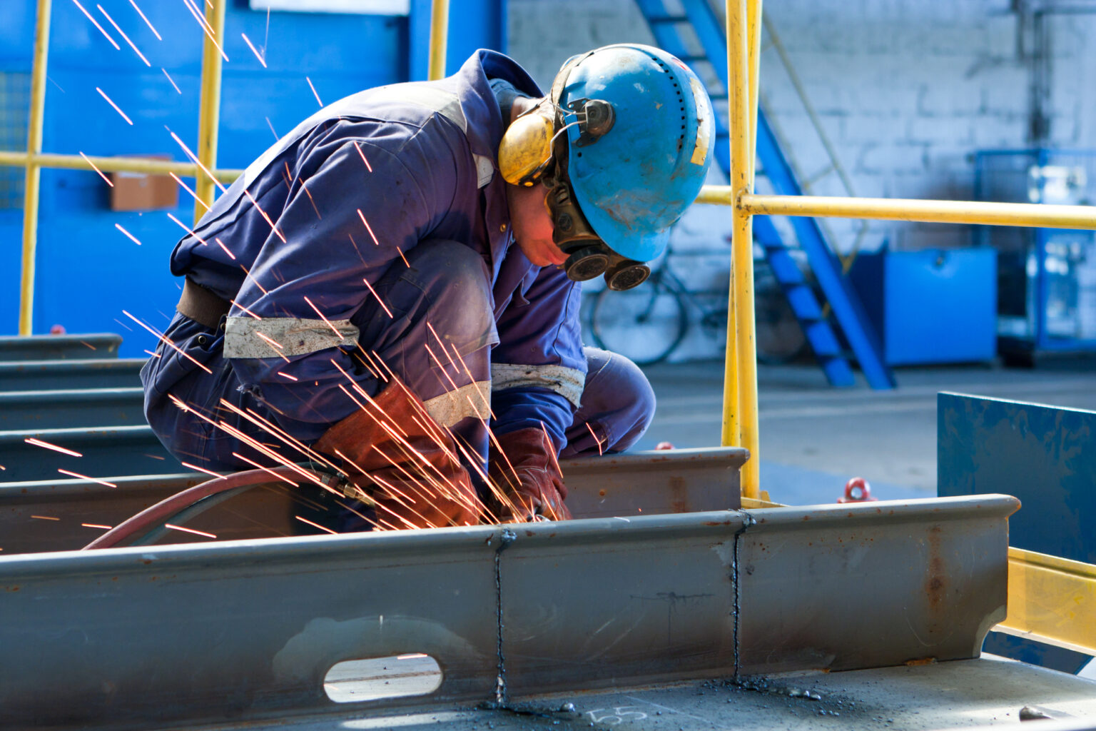 Welder Working On Site